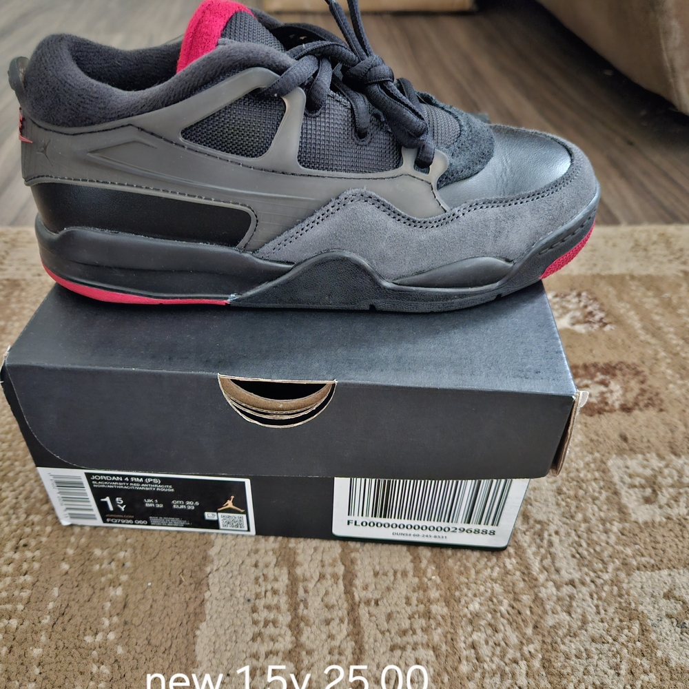 Jordan Low-Top Sneaker in Black with Red Accents